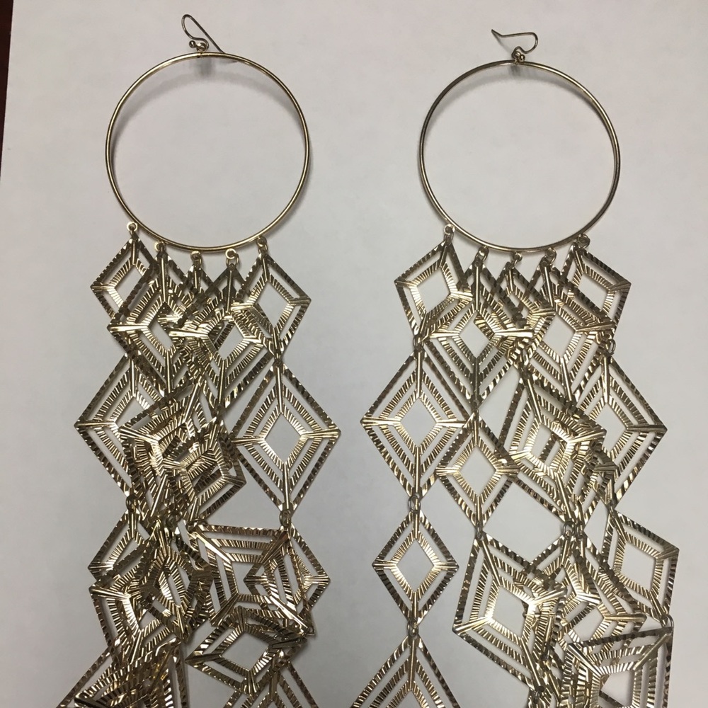 Gold Aztec fashion earrings